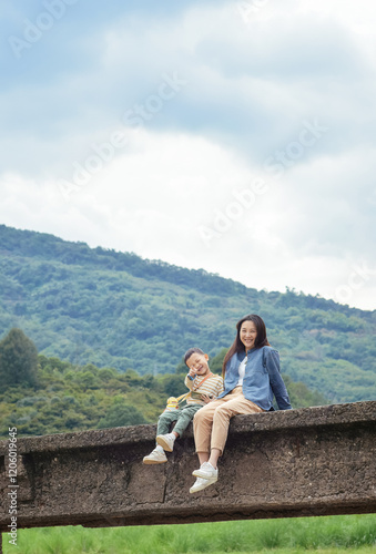 Chinese mother and son playing in Aodi Village, Tingxia Lake Reservoir Area, Fenghua, Ningbo, Zhejiang, China photo