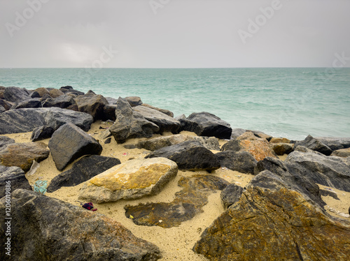 Arichal Munai is the southern tip of Rameswaram Island in Tamil Nadu, India, It is a unique geographical point where the Bay of Bengal and the Indian Ocean converge photo