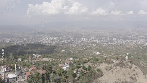 Left-to-right flyover of Skopje as seen from Vodno Mountain, showcasing the cityscape, landmarks, and natural surroundings