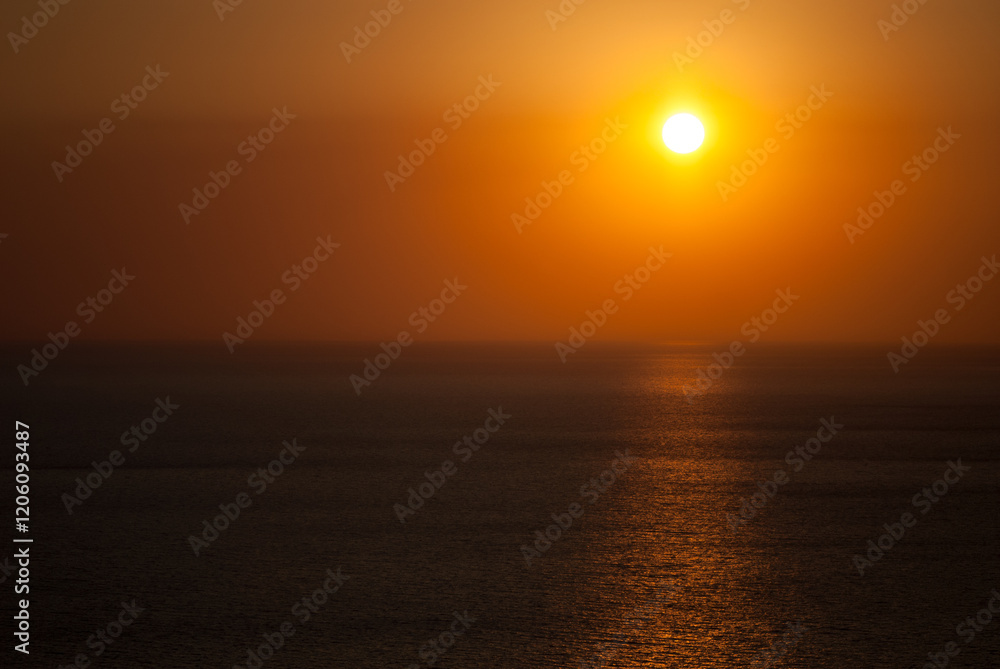 Setting sun and sea in August. Setting sun and sea in August.