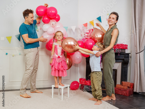 Little girl celebrate bday, surrounded by family and laughter