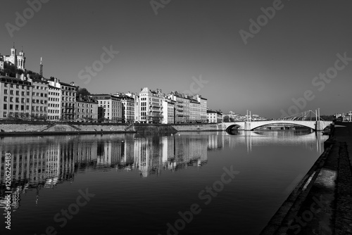 Urban scene with buildings around the River Saone, Lyon, France photo