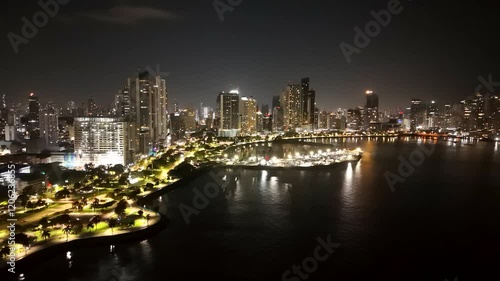 Aerial view of the Panama City skyline from the coastal strip at night, Panama. photo