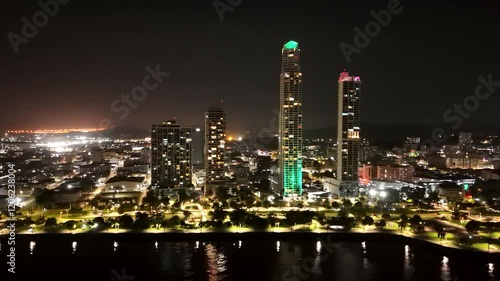 Aerial view of the Panama City skyline from the coastal strip at night, Panama. photo