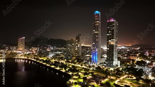 Aerial view of the Panama City skyline from the coastal strip at night, Panama. photo