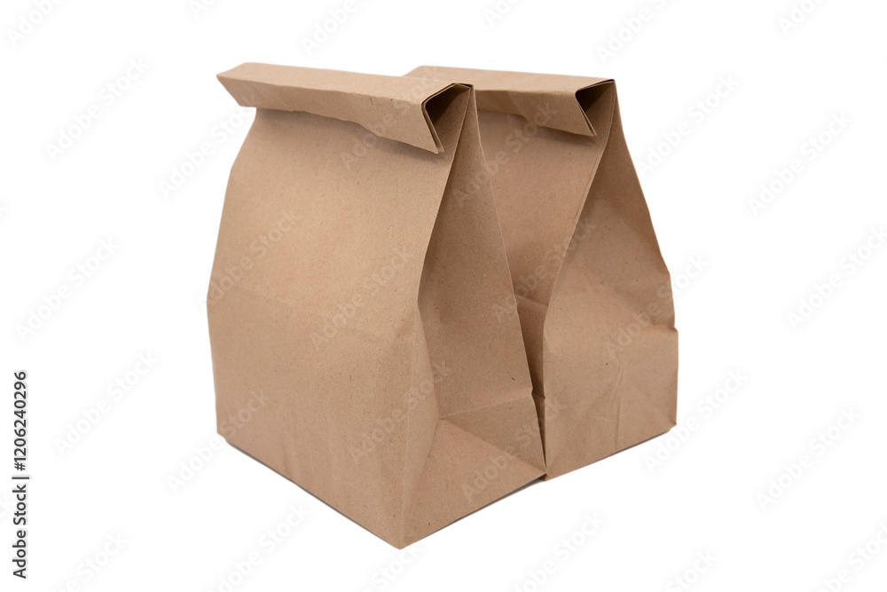 Two Closed Craft Paper Bags on White Background – Eco-Friendly Packaging Two Closed Craft Paper Bags on White Background – Eco-Friendly Packaging