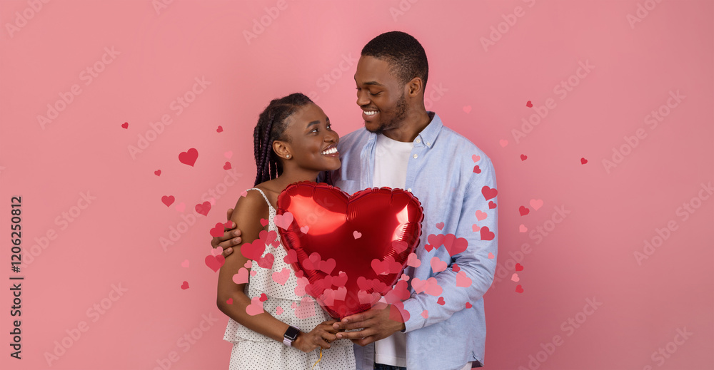 Black couple joyfully celebrates their love, sharing a kiss while holding a large red heart balloon. They are surrounded by floating hearts, symbolizing their bond and affection. Black couple joyfully celebrates their love, sharing a kiss while holding a large red heart balloon. They are surrounded by floating hearts, symbolizing their bond and affection.