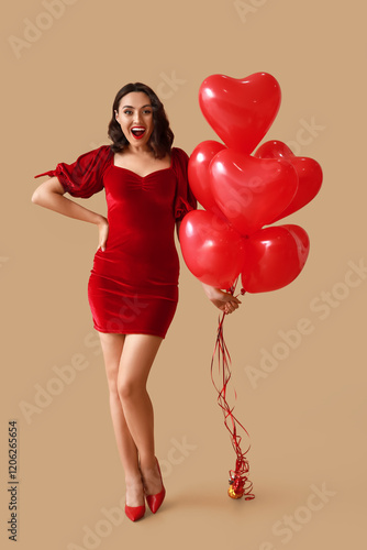 Happy young woman with hear...