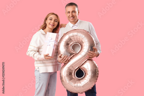 Middle-aged couple with gif...