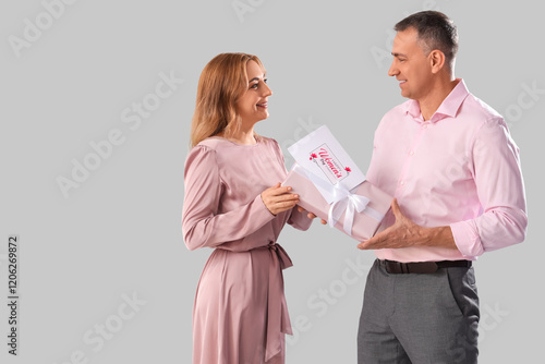 Middle-aged couple with gif...