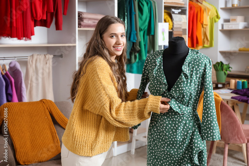 Female tailor with dress on...