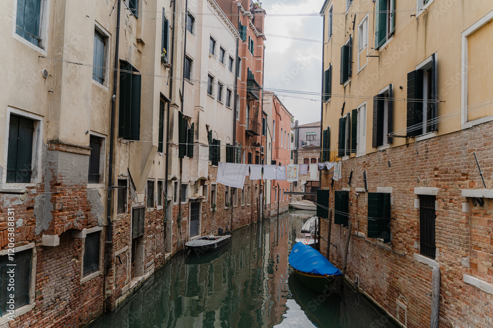 Laundry drying in Venice. Laundry hangs on a line between the streets. Laundry drying in Venice. Laundry hangs on a line between the streets.