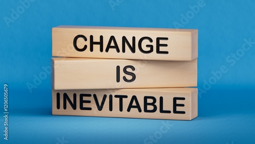Change is Inevitable symbol. Wooden blocks with words Change is Inevitable.Business and Change is Inevitable concept.3D rendering on blue background.