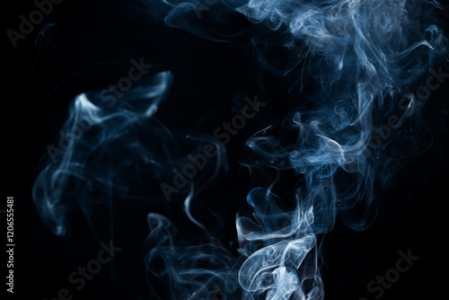 Smoke from flames or fog clouds graphic design art isolated on dark black background.