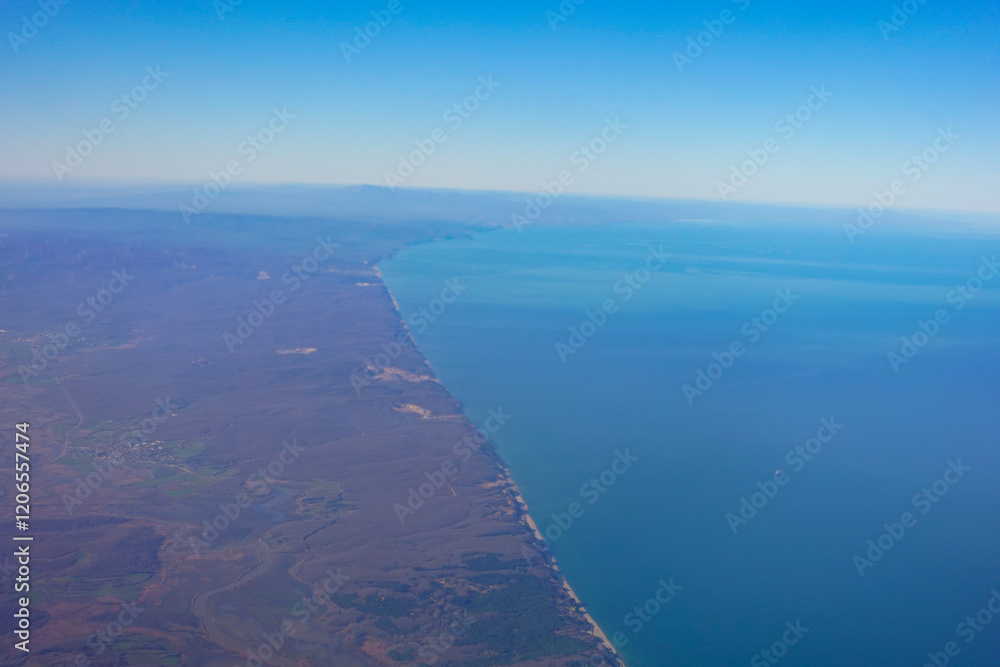 Aerial View of the Beautiful Coastal Landscape and Surrounding Ocean Waters Aerial View of the Beautiful Coastal Landscape and Surrounding Ocean Waters