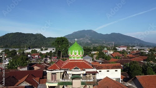 Aerial Panorama: Mosque, Highway, and Green Mountains