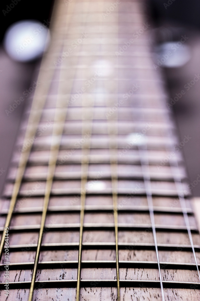 guitar strings and neck close-up guitar strings and neck close-up