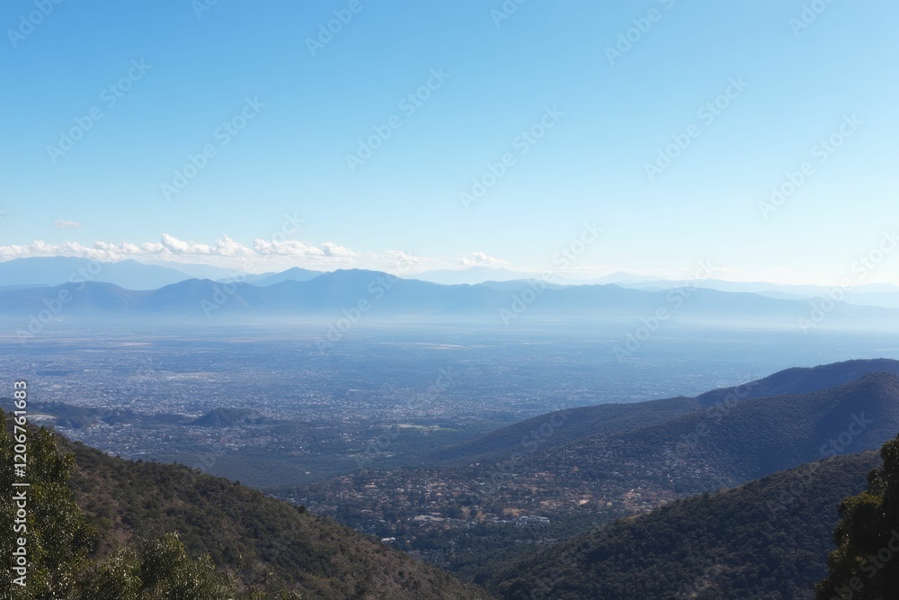 Mountainous landscape overlooking a sprawling city under a clear sky Mountainous landscape overlooking a sprawling city under a clear sky