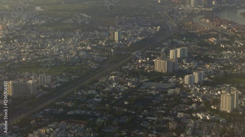 Wallpaper Mural Ho Chi Minh Skyline from Above
A panoramic view of skyscrapers, rivers, and urban sprawl in Ho Chi Minh City. Torontodigital.ca