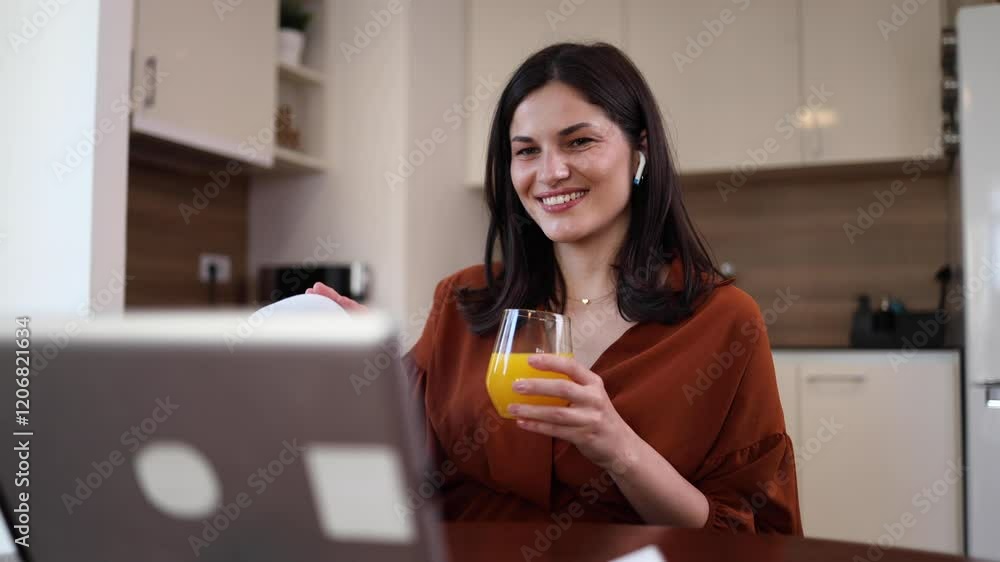 Woman relaxing at home and watching something on a tablet Woman relaxing at home and watching something on a tablet