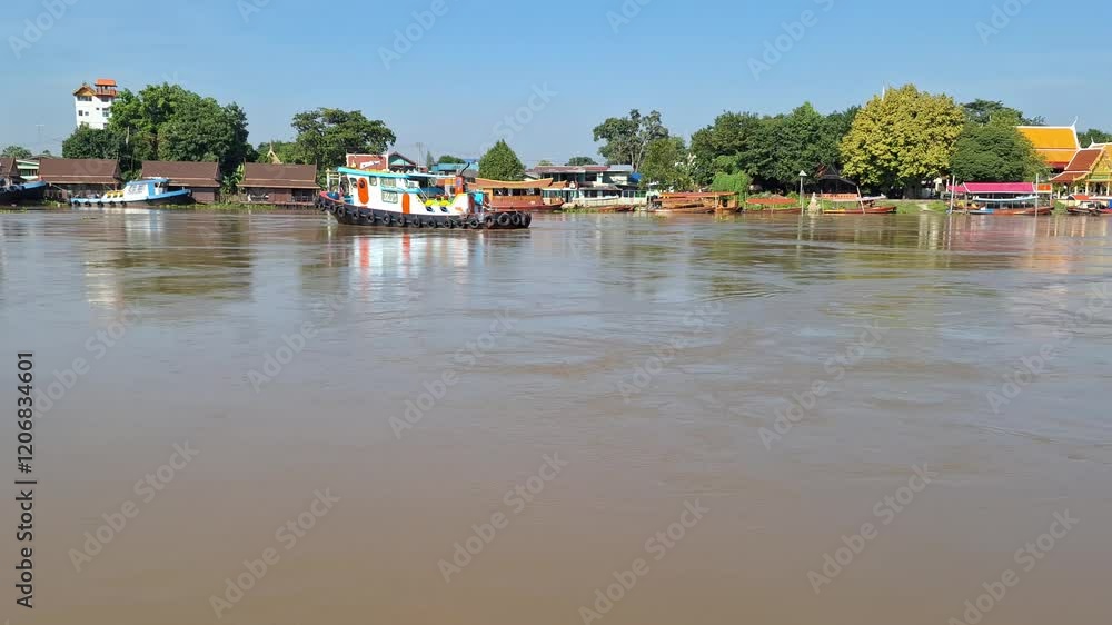 Thai tugboat sailing on the river Thai tugboat sailing on the river