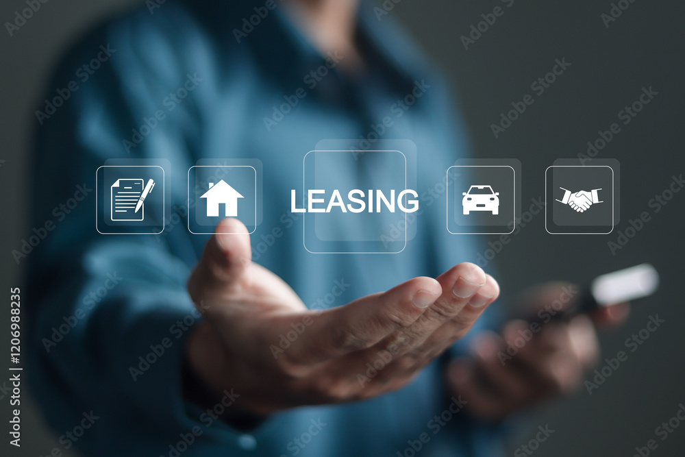 Leasing business concept, Businessman showing LEASING icon on virtual screen. Contract management, analyze leasing options and finance agreements for assets and vehicles. Leasing business concept, Businessman showing LEASING icon on virtual screen. Contract management, analyze leasing options and finance agreements for assets and vehicles.