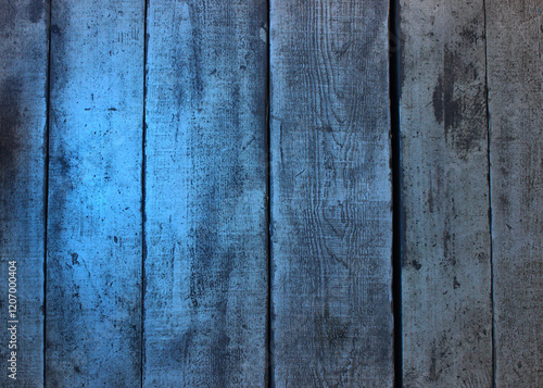 Blue stain on old wood boards with signs of aging. Old wooden planks pattern with enigmatic blue illumination 
 photo