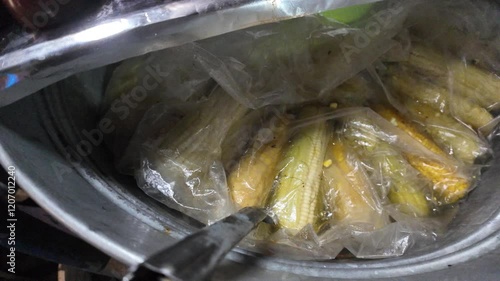 Discover the vibrant flavors of boiled corn elotes and esquites in Mexico's street food culture