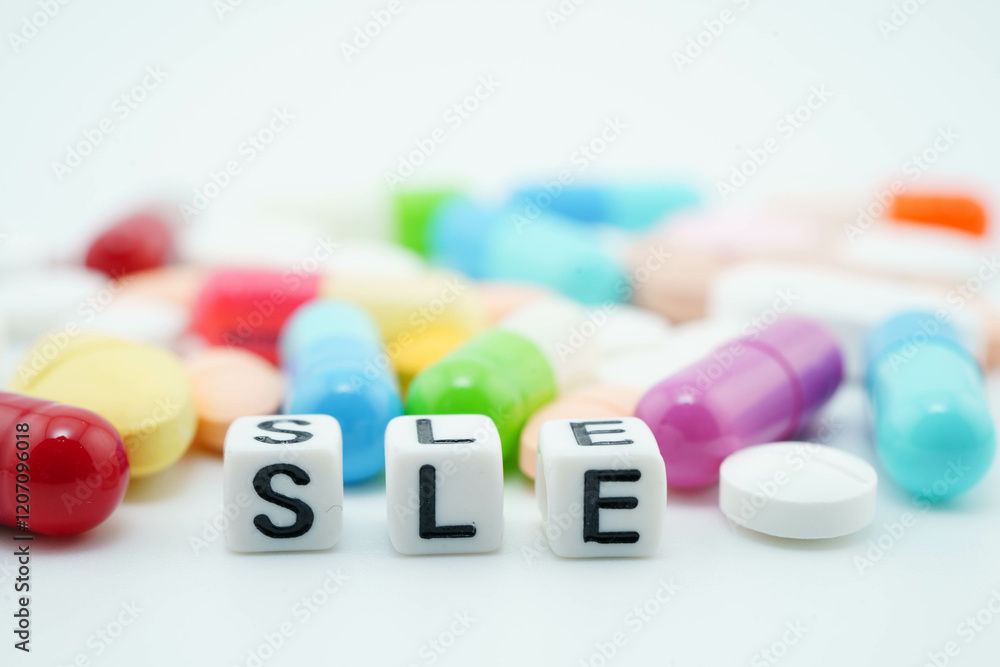 AIDS Acquired immunodeficiency syndrome word with pills and capsules medical drug. AIDS Acquired immunodeficiency syndrome word with pills and capsules medical drug.