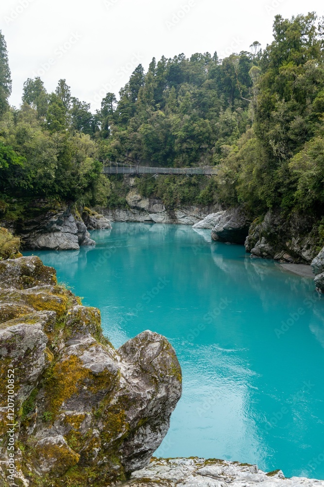 Hokitika Gorge with turquoise water and lush forest. Hokitika Gorge with turquoise water and lush forest.