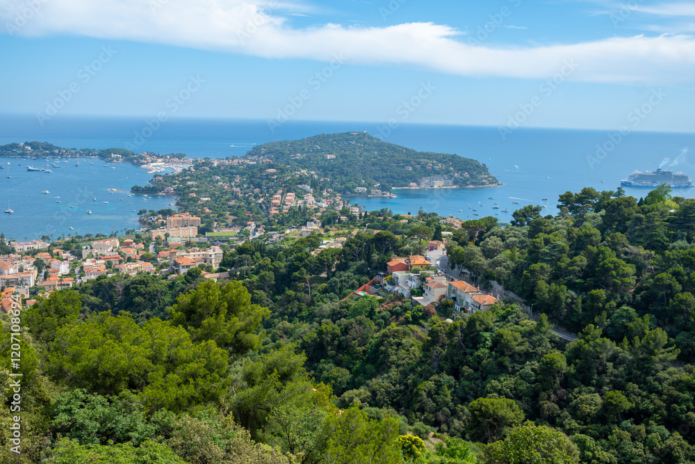 Panoramic view of Saint-Jean-Cap-Ferrat commune in Alpes-Maritimes in Provence-Alpes-Cote d'Azur, French Riviera, France Panoramic view of Saint-Jean-Cap-Ferrat commune in Alpes-Maritimes in Provence-Alpes-Cote d'Azur, French Riviera, France