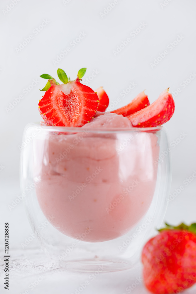 Strawberry tofu soy dessert in a glass. Lactose and sugar free. Vertical orientation, closeup. Selective focus. Strawberry tofu soy dessert in a glass. Lactose and sugar free. Vertical orientation, closeup. Selective focus.