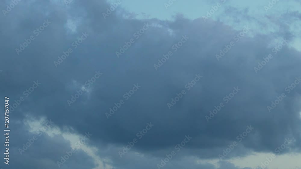 Thunderstorm Cloud, Stormy Atmosphere, Blue Yellow Sky and Gray Black Rain Cumulus Clouds in Sun Rays Time Lapse Slow Motion. Beautiful Tropical Storm Cloudy Sky. Thunderstorm Clouds and Blue Sky. Thunderstorm Cloud, Stormy Atmosphere, Blue Yellow Sky and Gray Black Rain Cumulus Clouds in Sun Rays Time Lapse Slow Motion. Beautiful Tropical Storm Cloudy Sky. Thunderstorm Clouds and Blue Sky.