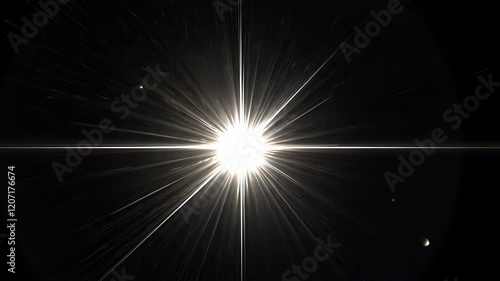 Bright light is shining on a dark background. The light is focused on a single point. There are a few other lights in the background
