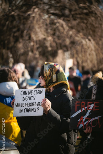 woman with sign during rally