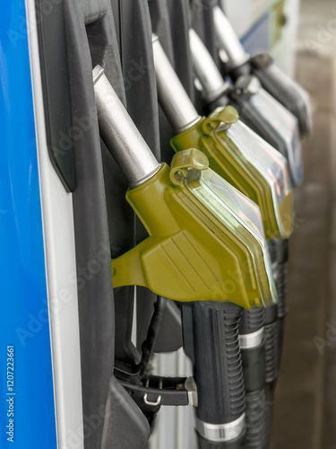 Drivers can refuel their vehicles from gas station stands using refueling guns. photo