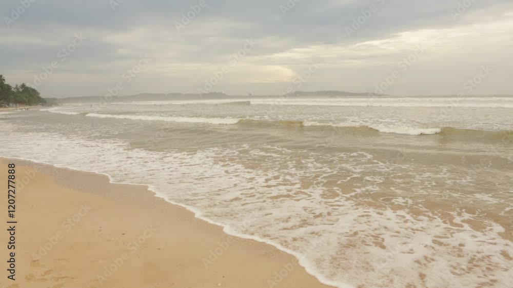 video with the coast of the Indian Ocean in Sri Lanka. The beach with calm waves. video with the coast of the Indian Ocean in Sri Lanka. The beach with calm waves.