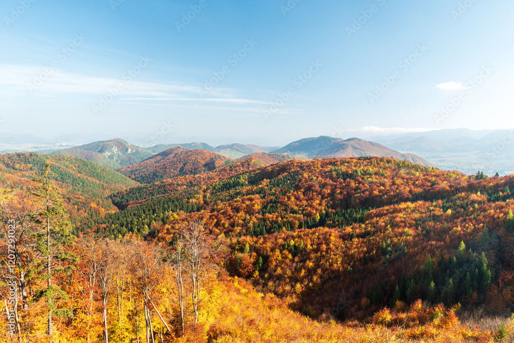 Colorful autumn Sulovske vrchy mountains - view from viewpoint above Zbynovsky Budzogan rock formation Colorful autumn Sulovske vrchy mountains - view from viewpoint above Zbynovsky Budzogan rock formation