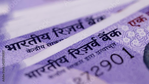 Close shot of Indian one hundred rupee notes. registering  name of Reserve Bank of India.