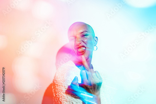 Woman doing a expressive defiance gesture with finger towards camera