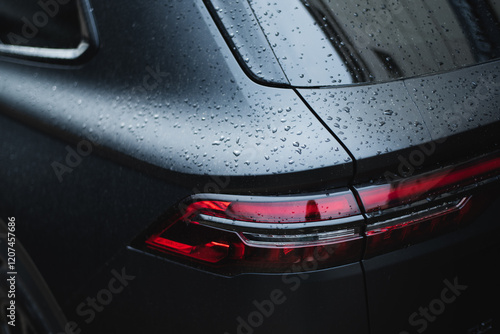Modern rear light on new matte black automobile