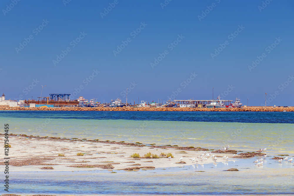 Fototapeta premium Fishing Port on Two-Tone Beach