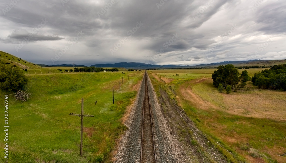 Scenic view of railroad tracks in Montana on road to Yellowstone National Park Scenic view of railroad tracks in Montana on road to Yellowstone National Park