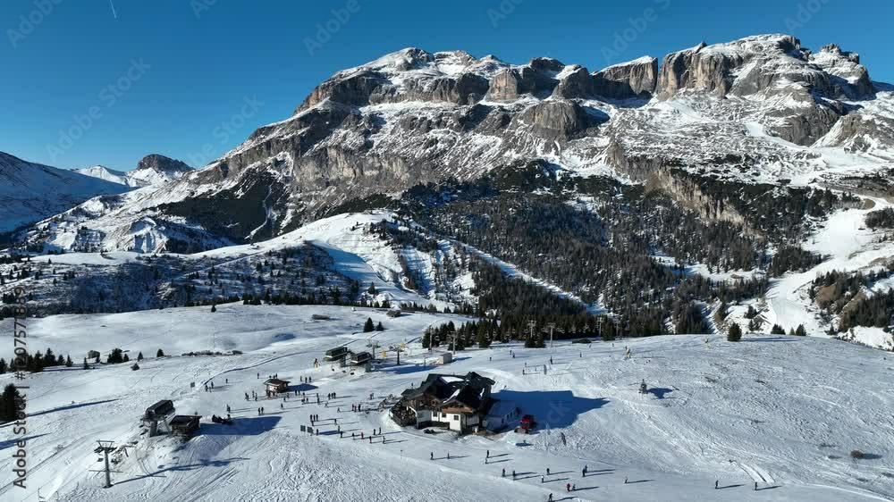 Sella Ronda group. Italian Dolomites drone aerial view in winter snow ski sunny days. Sella Ronda Marmolada .Aerial landscape of snowy Italian Alps Dolomites with Sella group in front and Marmolada. Sella Ronda group. Italian Dolomites drone aerial view in winter snow ski sunny days. Sella Ronda Marmolada .Aerial landscape of snowy Italian Alps Dolomites with Sella group in front and Marmolada.