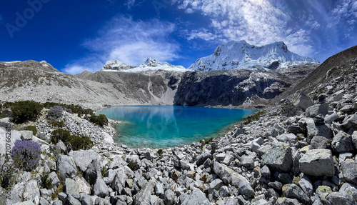 Peru, panoramic view of scenic Laguna 69 lake in Huascaran National Park, snowcapped peruvian mountains Andes, Cordyliera Blanca photo