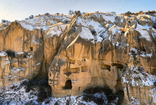 Fotografie Eroded volcanic tuff early Christian troglodyte cave dwelling rooms in Goreme Op