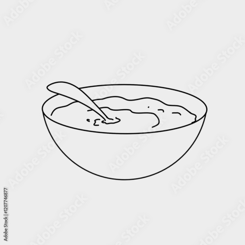 a bowl of porridge with a spoon on a white background