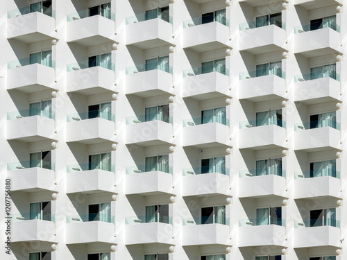 Geometric building background. Architectural detail of a geometrically designed apartment block in Valdelagrana, El Puerto de Santa Maria, Cadiz, Spain. Modern flats. Contemporary architecture.