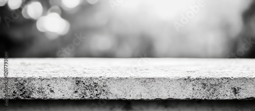 Textured concrete surface in black and white with blurred background and copy space for text placement photo