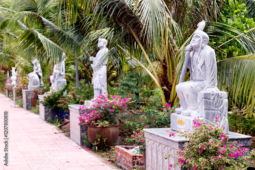 Eighteen Arhats of Mahayana Buddhism await return of Buddha as Maitreya, Long Quang Pagoda, An Giang Province, Mekong Delta, Vietnam photo